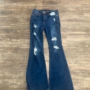 Almost Famous dark washes ripped flare jeans. Size 5